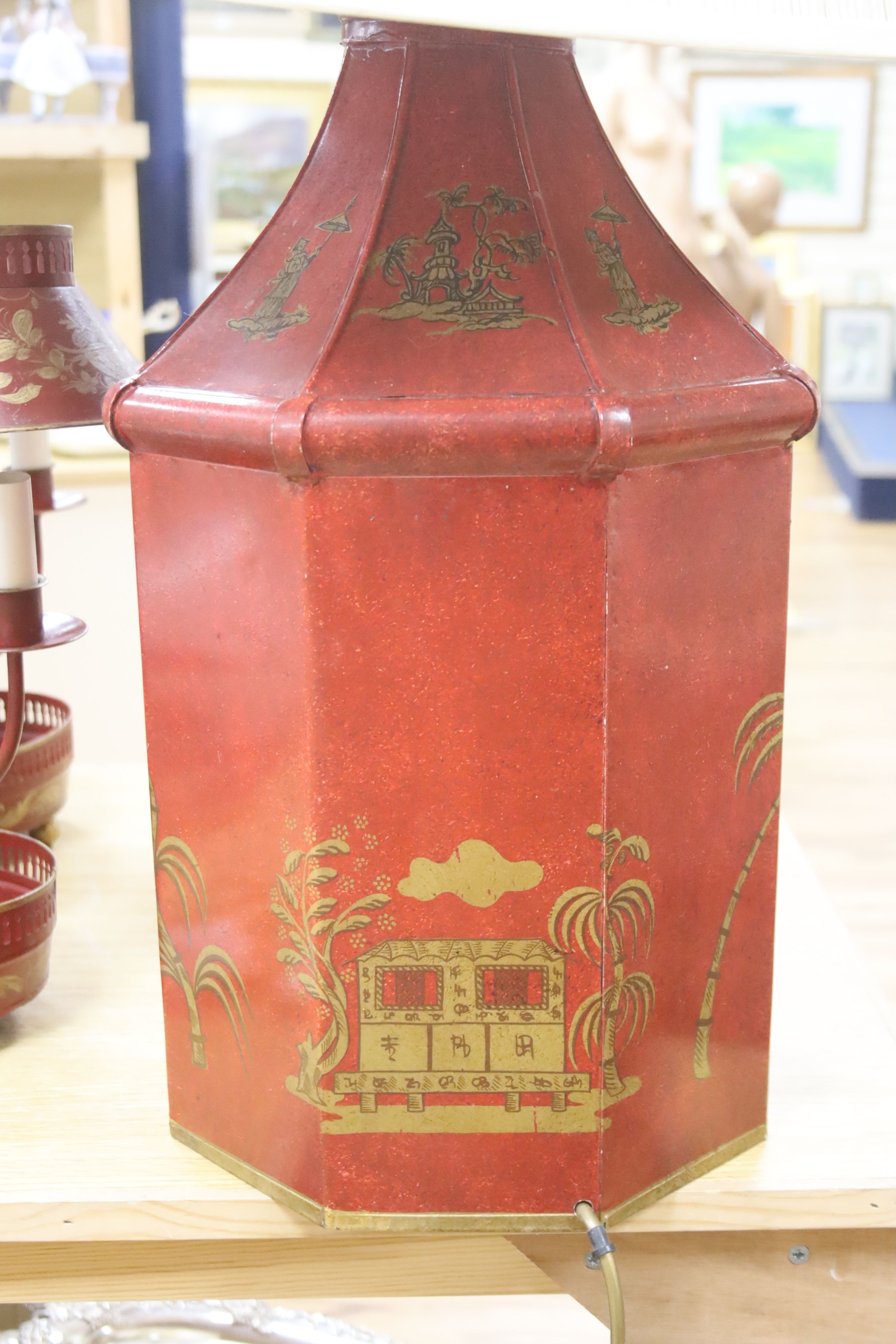 A pair of toleware student's lamps and one other, height 52cm excl. light fitting